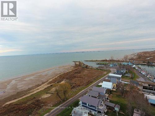 Marina entrance view. - 1 Duncan Street, Norfolk (Turkey Point), ON - Outdoor With Body Of Water With View