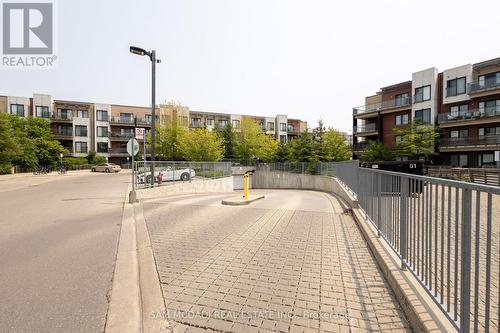 211 - 5025 Harvard Road, Mississauga, ON - Outdoor With Balcony