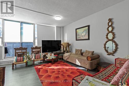 211 - 1050 Stainton Drive, Mississauga, ON - Indoor Photo Showing Living Room