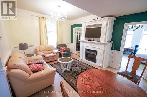 552 Adelaide Street N, London East (East G), ON - Indoor Photo Showing Living Room With Fireplace