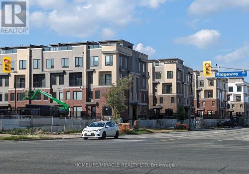 02 - 3415 Ridgeway Drive, Mississauga, ON - Outdoor With Facade