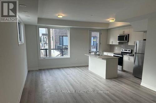 02 - 3415 Ridgeway Drive, Mississauga, ON - Indoor Photo Showing Kitchen With Stainless Steel Kitchen