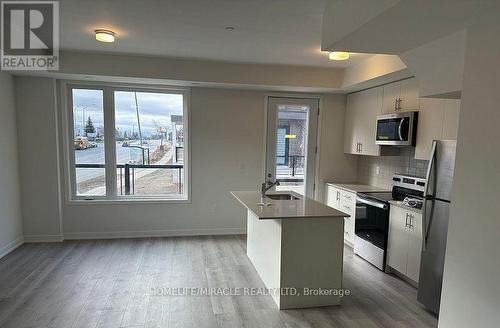 02 - 3415 Ridgeway Drive, Mississauga, ON - Indoor Photo Showing Kitchen With Stainless Steel Kitchen