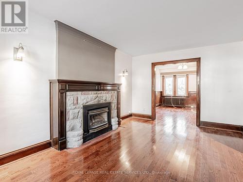7 Duplex Crescent, Toronto, ON - Indoor Photo Showing Living Room With Fireplace