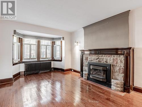 7 Duplex Crescent, Toronto, ON - Indoor Photo Showing Living Room With Fireplace