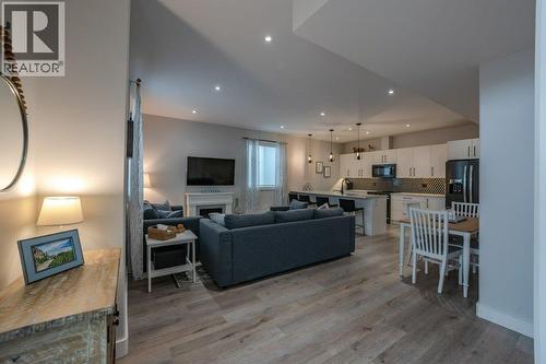 535 Westminster Avenue W Unit# 102, Penticton, BC - Indoor Photo Showing Living Room With Fireplace