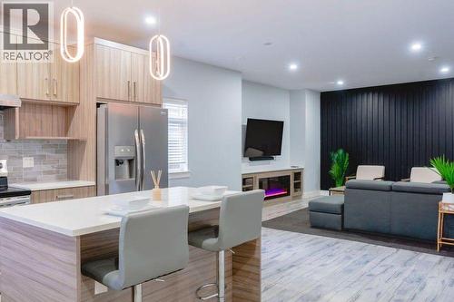 VIRTUALLY STAGED - 722 Coopland Crescent Unit# 1, Kelowna, BC - Indoor Photo Showing Other Room