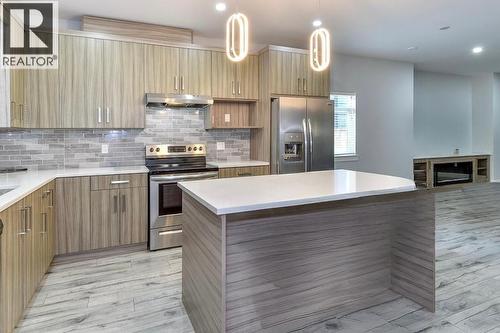 722 Coopland Crescent Unit# 1, Kelowna, BC - Indoor Photo Showing Kitchen With Stainless Steel Kitchen With Upgraded Kitchen