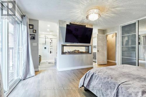 112 Old Varcoe Road, Clarington, ON - Indoor Photo Showing Bedroom With Fireplace