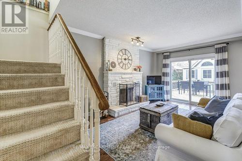 149 Charterhouse Crescent, Hamilton, ON - Indoor Photo Showing Living Room With Fireplace