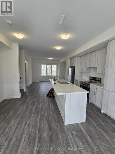 3 - 7 Kingbird Common, Cambridge, ON - Indoor Photo Showing Kitchen With Double Sink