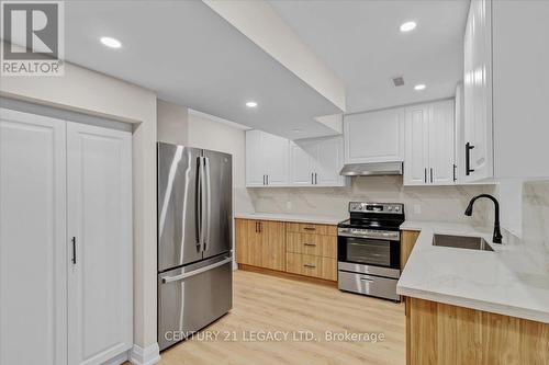 Pantry & Kitchen - 2027 Churchill Avenue, Burlington, ON - Indoor Photo Showing Kitchen With Upgraded Kitchen