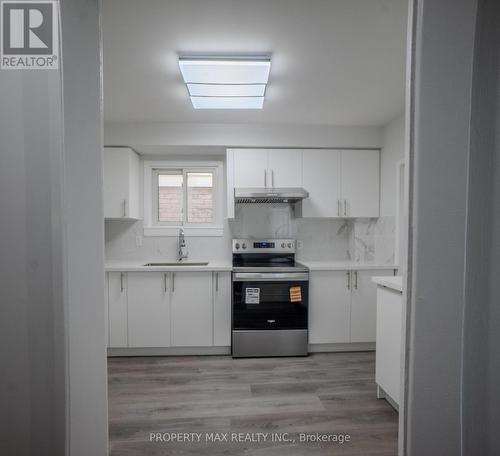 52 Whispering Willow Pathway, Toronto, ON - Indoor Photo Showing Kitchen