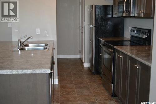 202 2141 Larter Road, Estevan, SK - Indoor Photo Showing Kitchen With Double Sink