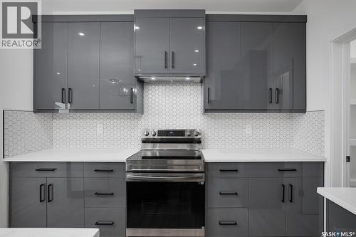 207 Taskamanwa Street, Saskatoon, SK - Indoor Photo Showing Kitchen With Upgraded Kitchen