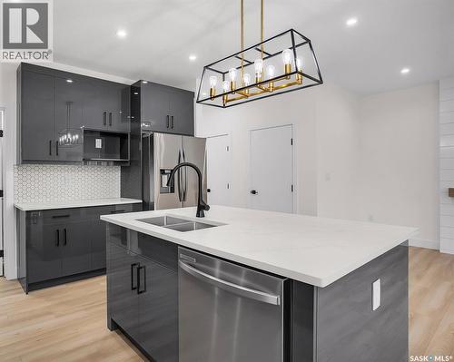 207 Taskamanwa Street, Saskatoon, SK - Indoor Photo Showing Kitchen With Double Sink With Upgraded Kitchen