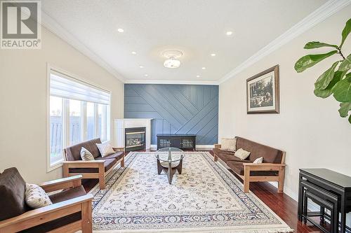 3565 Stonecutter Crescent, Mississauga, ON - Indoor Photo Showing Living Room With Fireplace