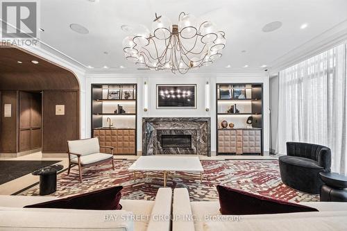 2707 - 30 Inn On The Park Drive, Toronto, ON - Indoor Photo Showing Other Room With Fireplace