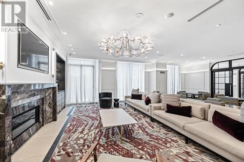 2707 - 30 Inn On The Park Drive, Toronto, ON - Indoor With Fireplace