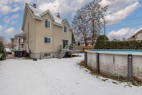 Backyard - 339 Rue Ste-Marie, Sainte-Marthe-Sur-Le-Lac, QC - Outdoor With Above Ground Pool