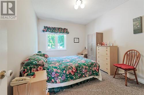 1834 Tiny Beaches Road S, Tiny, ON - Indoor Photo Showing Bedroom