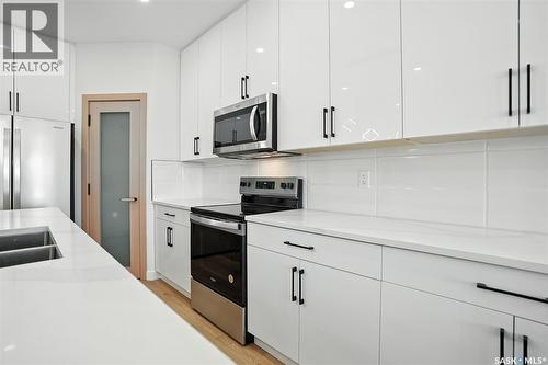 119 1509 Richardson Road, Saskatoon, SK - Indoor Photo Showing Kitchen With Double Sink With Upgraded Kitchen