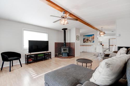 Living room - 621-3950 Boul. Sir-Wilfrid-Laurier, Longueuil (Saint-Hubert), QC - Indoor Photo Showing Living Room With Fireplace