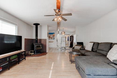 Living room - 621-3950 Boul. Sir-Wilfrid-Laurier, Longueuil (Saint-Hubert), QC - Indoor Photo Showing Living Room With Fireplace