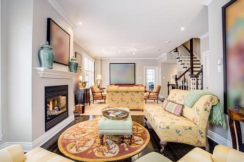 Salon - 4413 Boul. Décarie, Montréal (Côte-Des-Neiges/Notre-Dame-De-Grâce), QC - Indoor Photo Showing Living Room With Fireplace