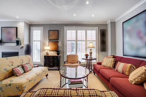 Salon - 4413 Boul. Décarie, Montréal (Côte-Des-Neiges/Notre-Dame-De-Grâce), QC - Indoor Photo Showing Living Room With Fireplace