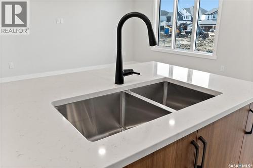 120 Reddekopp Crescent, Warman, SK - Indoor Photo Showing Kitchen With Double Sink