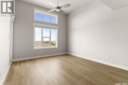 411 5301 Universal Crescent, Regina, SK - Indoor Photo Showing Other Room