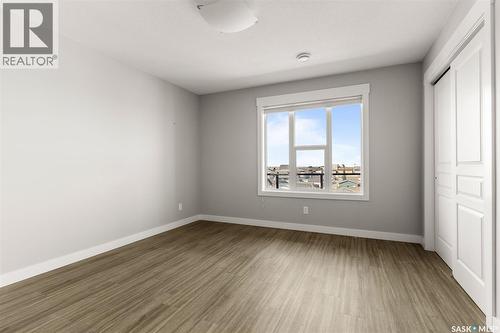 411 5301 Universal Crescent, Regina, SK - Indoor Photo Showing Other Room