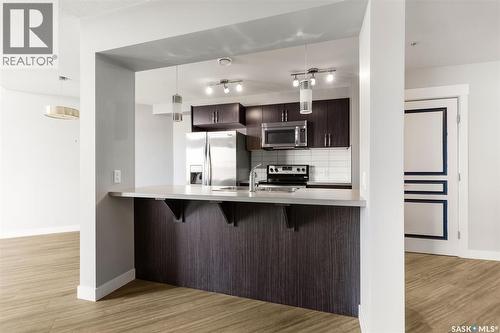 411 5301 Universal Crescent, Regina, SK - Indoor Photo Showing Kitchen With Upgraded Kitchen