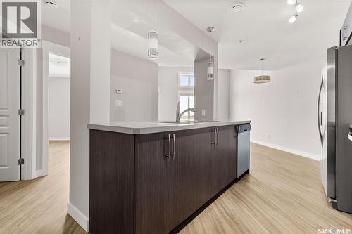 411 5301 Universal Crescent, Regina, SK - Indoor Photo Showing Other Room