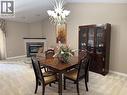 11285 Firgrove Drive, Windsor, ON  - Indoor Photo Showing Dining Room With Fireplace 