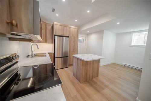 221 4Th Avenue, Cranbrook, BC - Indoor Photo Showing Kitchen With Double Sink