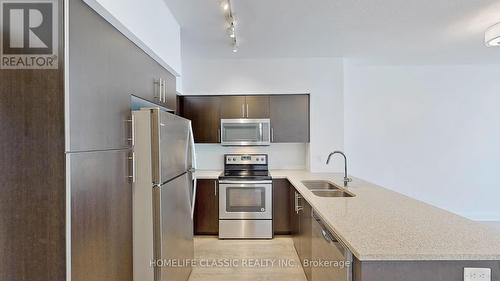 507 - 55 Speers Road, Oakville, ON - Indoor Photo Showing Kitchen With Double Sink With Upgraded Kitchen