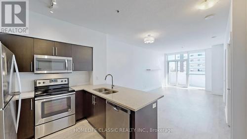 507 - 55 Speers Road, Oakville, ON - Indoor Photo Showing Kitchen With Double Sink With Upgraded Kitchen