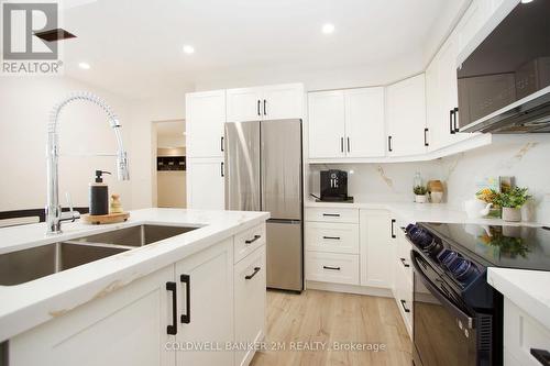 27 - C-12 1655 Nash Road, Clarington (Courtice), ON - Indoor Photo Showing Kitchen With Double Sink With Upgraded Kitchen