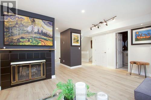 27 - C-12 1655 Nash Road, Clarington (Courtice), ON - Indoor Photo Showing Other Room With Fireplace