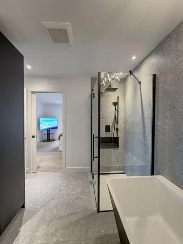 Salle de bains attenante à la CCP - 100 22E Rue Du Lac-Des-Français, Sainte-Marcelline-De-Kildare, QC - Indoor Photo Showing Bathroom