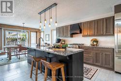 Kitchen with walkout to back yard - 