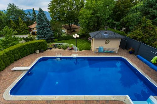 1061 Avondale Place, West Kelowna, BC - Outdoor With In Ground Pool With Deck Patio Veranda With Backyard
