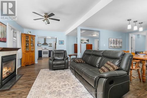 290 South Waseosa Lake Road, Huntsville, ON - Indoor Photo Showing Living Room With Fireplace