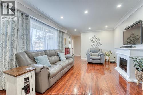 111 Danforth, Leamington, ON - Indoor Photo Showing Living Room With Fireplace