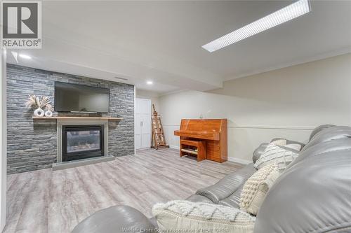 111 Danforth, Leamington, ON - Indoor Photo Showing Living Room With Fireplace