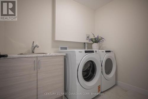 4295 Calhoun Way, London South (South V), ON - Indoor Photo Showing Laundry Room