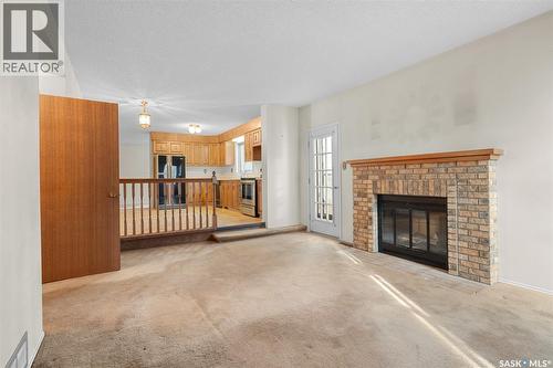 3259 Westminster Road, Regina, SK - Indoor Photo Showing Living Room With Fireplace