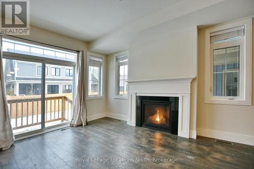 185 Yellow Birch Crescent, Blue Mountains, ON - Indoor Photo Showing Living Room With Fireplace